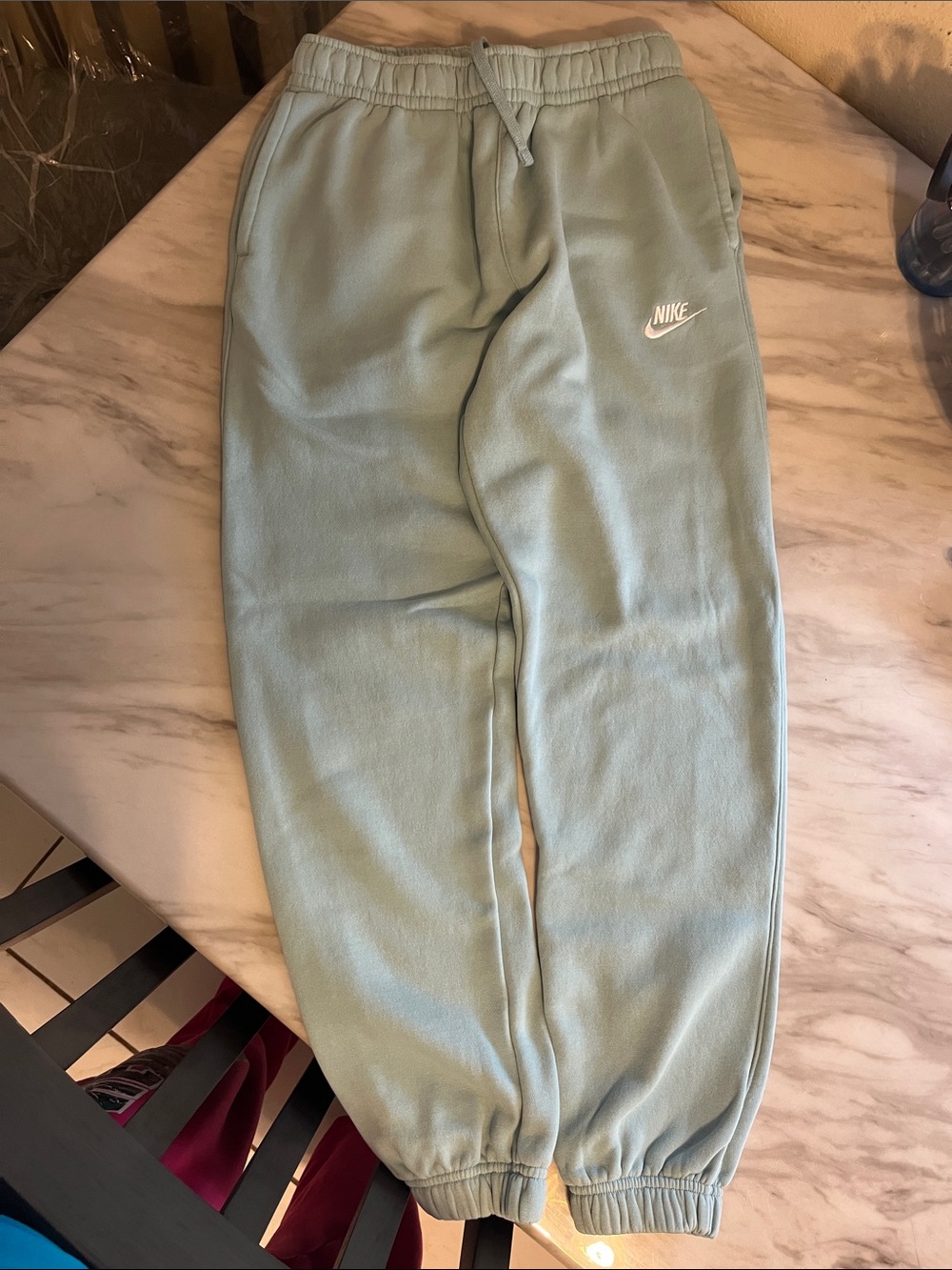 Nike Kids Sage Green Sweatpants with White Swoosh Logo